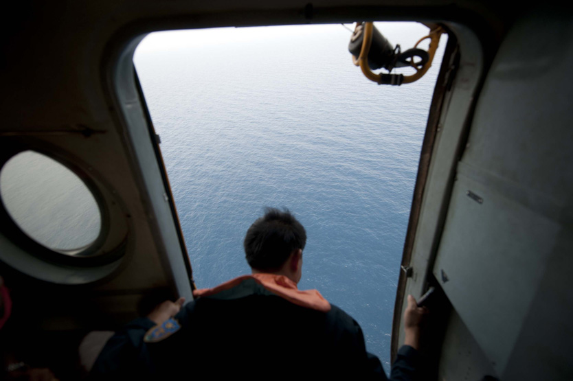 Поиски самолета MH370